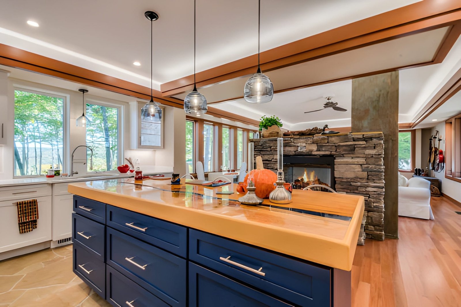 Modern kitchen with blue island cabinets